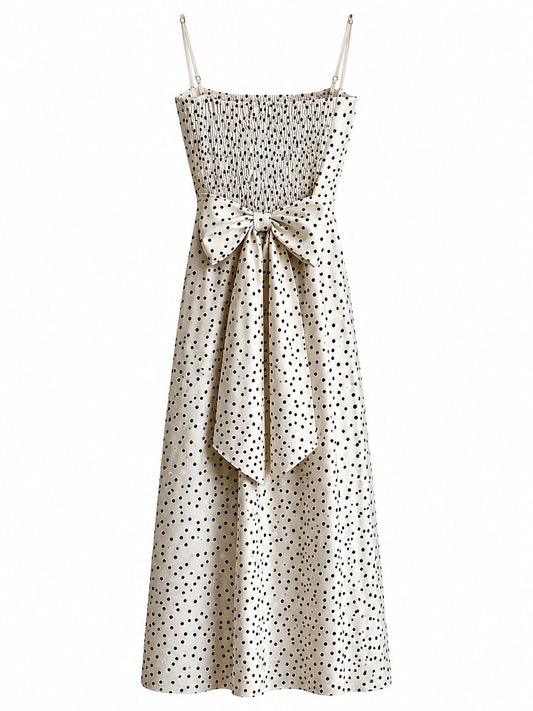 Abito midi bianco a pois con fiocco